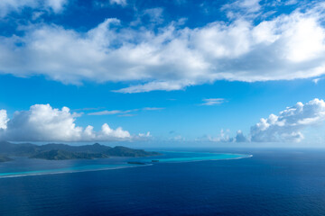 Aerial view of Tahaa island, French Polynesia, with turquoise lagoon and reef