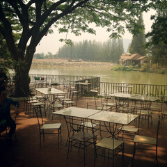 Riverside Café Under a Shady Tree