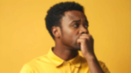 Blurred background illustrating a moment of creative brainstorming, with a radiant yellow backdrop that sparks innovation