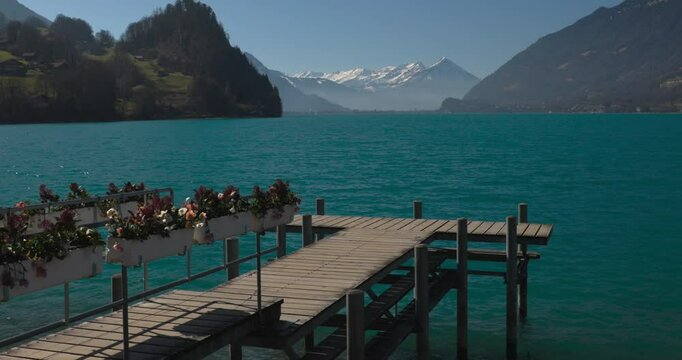 Iseltwald, Lake Brienz in Switzerland with Pier and Stunning View of Brienzer Rothorn, Jungfrau, Eiger, and M&ouml;nch