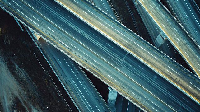 Asphalt being laid on a busy highway during the daytime, showcasing the construction process