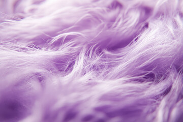 Fototapeta premium Close up of soft purple furry fabric texture with flowing patterns and vibrant hue