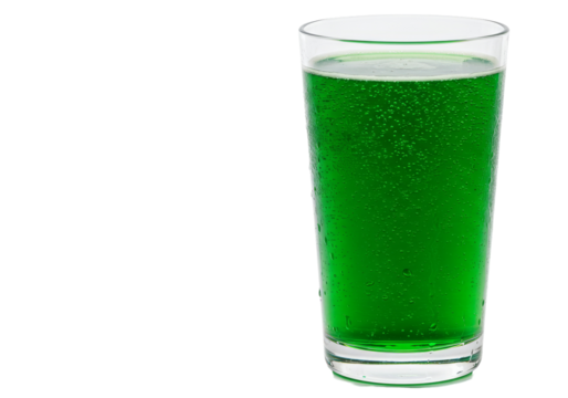 Refreshing Green Beverage in Glass - Close-up of a glass filled with a vibrant green, bubbly drink. Perfect for summer or St. Patrick's Day