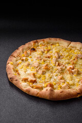 Hawaiian pizza with chicken, pineapple, corn and cheese