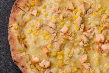 Hawaiian pizza with chicken, pineapple, corn and cheese