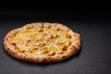 Hawaiian pizza with chicken, pineapple, corn and cheese