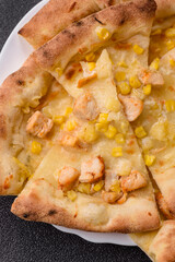 Hawaiian pizza with chicken, pineapple, corn and cheese