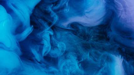 Watercolor ink. Fume splash. Blue violet haze flow mix color liquid texture. Blur curve stream fantasy spread on black abstract background.
