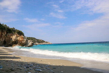 Sand, rocks and beautiful colors of Greek Adriatic Sea