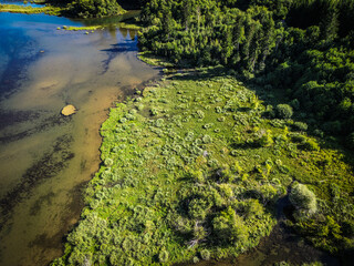 Aerial photography of lake Lepenica mountain stream, overgrown in wild vegetation of Gorski Kotar region in Croatia