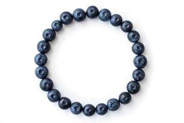 Obraz premium a bracelet with blue beads on a white background
