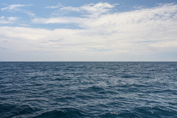 Side view from boat in Indian ocean sailing between Seychelles islands in daytime