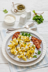 sacchettoni, pasta with bacon and cheese filling