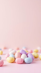 Obraz premium A close-up photo of a collection of colorful, dye-free Easter eggs on a pink background with blurred edges.