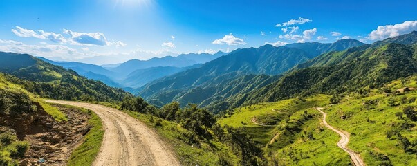 Scenic Mountain Landscape with Curved Path and Blue Sky View