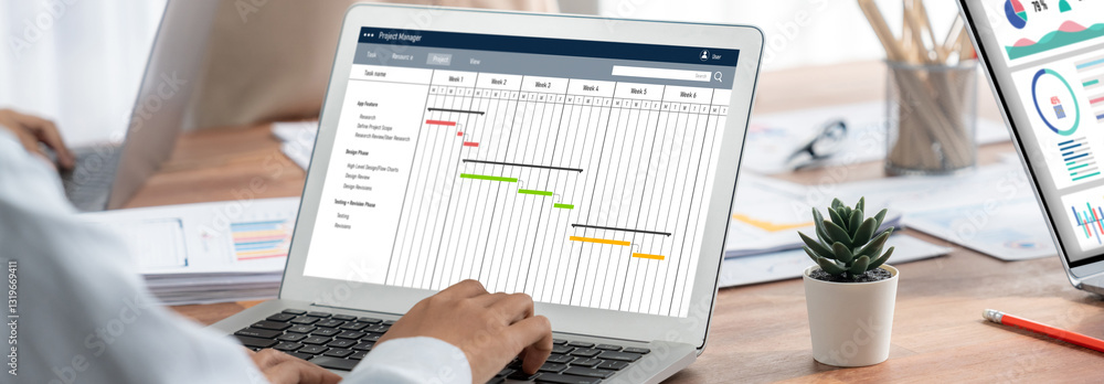 Poster Project planning software for brisk business project management on the computer screen showing timeline chart of the team project