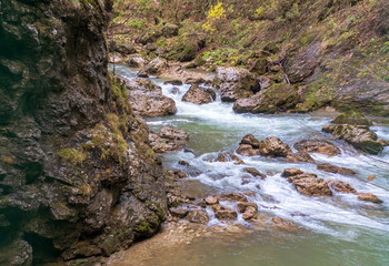 panoramic view and autumn walks along the canyon of the mountain river located in the gorge of the mountain range