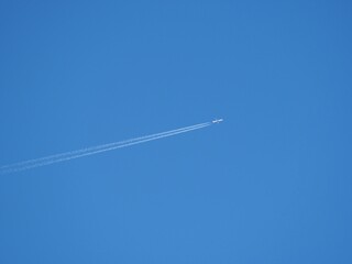 Airplane clouds in early spring, Colorado
