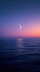 Crescent moon shining over calm sea at twilight, minimalist landscape photography