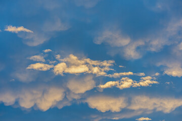 blue sky with golden clouds