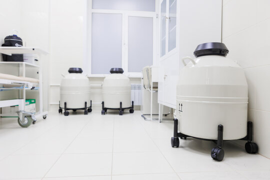 The clean, organized clinical lab has cryogenic storage tanks for preserving biological samples safely