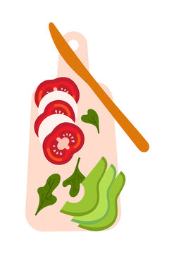 Fresh vegetable slices on a wooden cutting board with a knife. Sliced tomatoes, avocado, mozzarella cheese and greens for a healthy meal. Perfect for cooking, food prep, and nutrition concepts