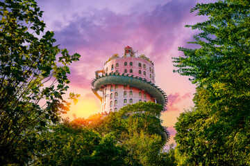 Stunning wat Samphran temple, pink dragon tower in Thailand at sunset