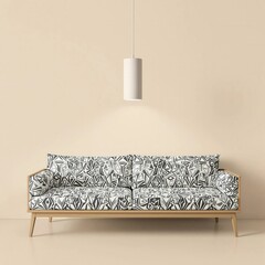 A black and white patterned sofa is sitting in a room with a white wall