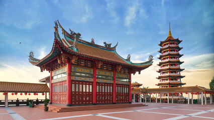 Fototapeta premium The Chin Swee Caves Temple in Genting Highlands, Malaysia, is renowned for its exquisite architecture, intricate design, and serene ambiance, set against the backdrop of tranquil skies