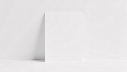 A minimalist white book standing upright against a soft shadow, exuding simplicity and elegance.