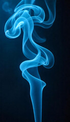 Obraz premium Ethereal blue smoke swirling gracefully against a dark background, creating a dreamy and mystical atmosphere.