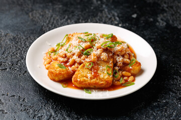 Loaded Hash Browns with baked beans and cheese