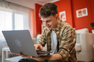 young man student work from home or study from laptop