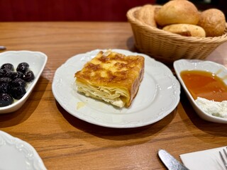 Delicious Turkish Tray pastry, Su boregi with cheese. Adana borek.