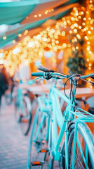 Fototapeta premium Vintage bicycles parked along a street with festive light bokeh