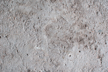 Imagen de una pared de cemento gris desgastada ideal para texturas de casa