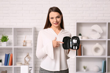 Young woman with diabetes set in office