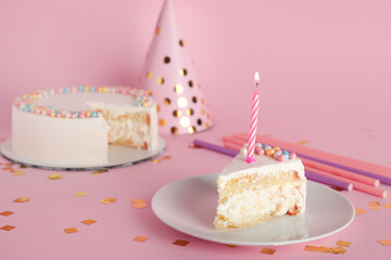 Piece of tasty Birthday cake on pink background