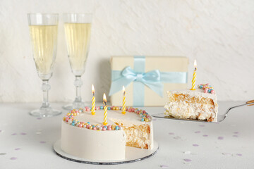 Tasty Birthday cake on light background