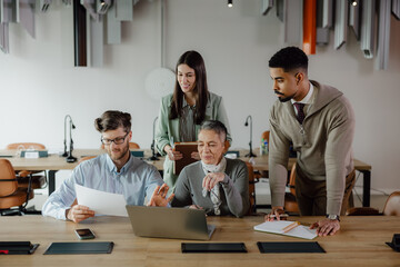 Collaborative Team Meeting in a Modern Office Setting