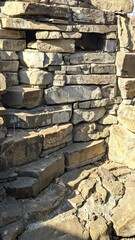 The wall is lined with stone