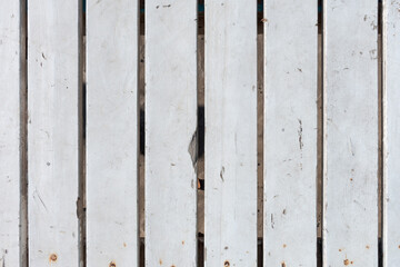 Texture of wooden slats painted white.