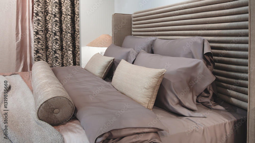 Poster a bed with a white comforter and pillows. the bed is neatly made and the pillows are arranged in a w