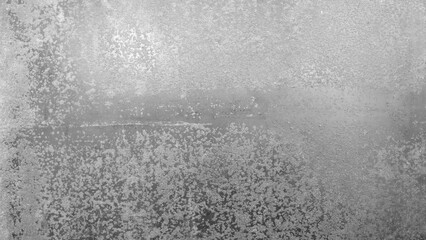 A grey wall with a lot of scratches and marks. The wall appears to be old and worn down © Aleksandr Matveev