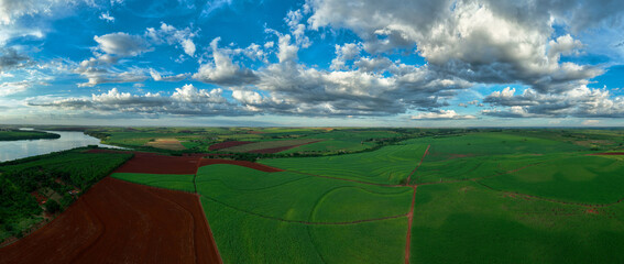 aerial view of sugarcane fields bordering the Tiete River at dusk