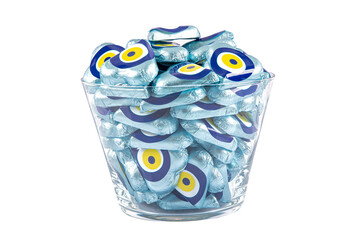 Chocolate with heart shaped evil eye beads covered with aluminum foil. Heart shaped chocolates...