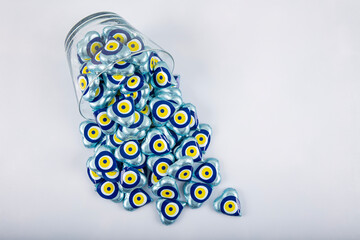 Chocolate with heart shaped evil eye beads covered with aluminum foil. Heart shaped chocolates...