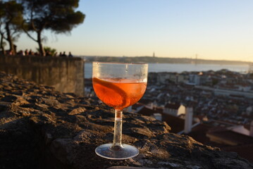 glass of red wine at sunset