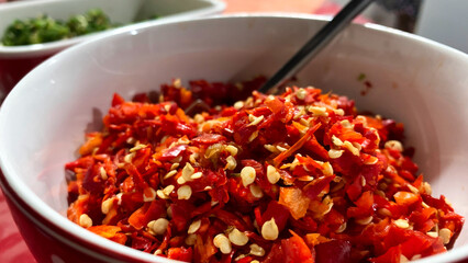 Roughly chopped fresh green chilies placed in a bowl
