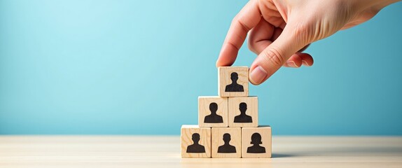 Human resources, concept of corporate hierarchy and multilevel marketing - complete team of a recruiter illustrated by wooden cubes with one leader icon.